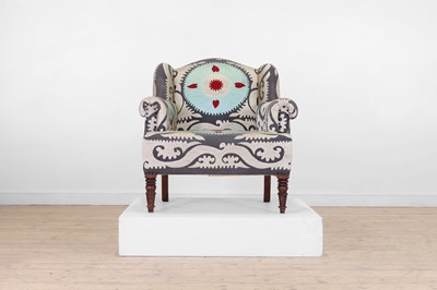 Lot 49 - A Victorian-style wingback armchair