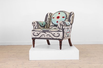 Lot 49 - A Victorian-style wingback armchair