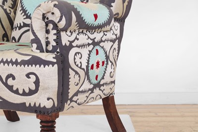 Lot 49 - A Victorian-style wingback armchair