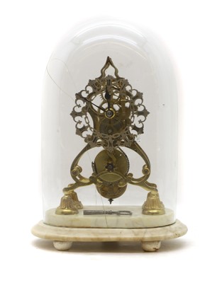 Lot 173 - A brass skeleton timepiece clock