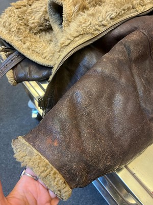 Lot 264 - A WWII Irvin pattern sheep skin and fleece lined leather flying jacket