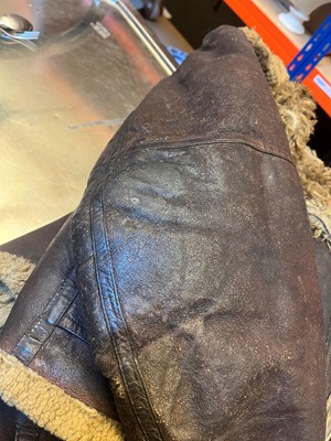 Lot 264 - A WWII Irvin pattern sheep skin and fleece lined leather flying jacket