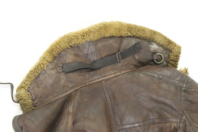 Lot 264 - A WWII Irvin pattern sheep skin and fleece lined leather flying jacket