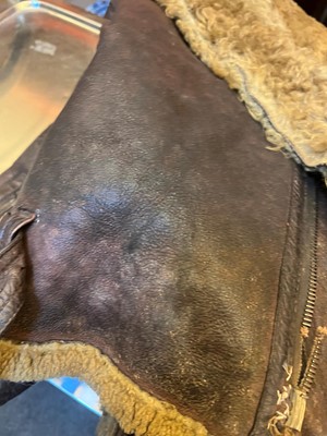 Lot 264 - A WWII Irvin pattern sheep skin and fleece lined leather flying jacket