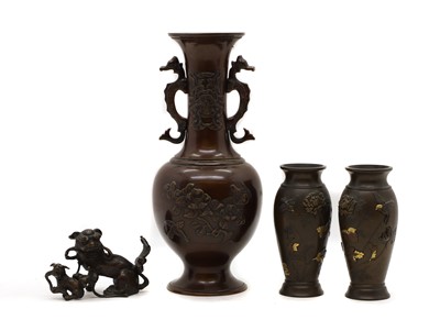 Lot 76 - A group of Japanese plum bronze vases