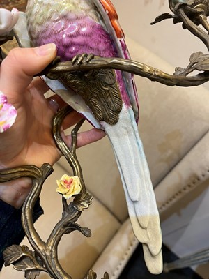 Lot 105 - A pair of porcelain and ormolu wall lights