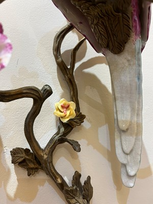 Lot 105 - A pair of porcelain and ormolu wall lights