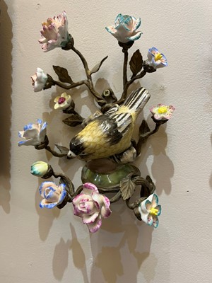 Lot 105 - A pair of porcelain and ormolu wall lights