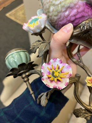 Lot 105 - A pair of porcelain and ormolu wall lights