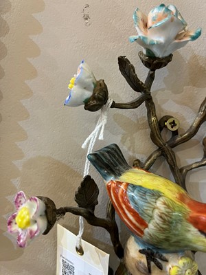 Lot 105 - A pair of porcelain and ormolu wall lights