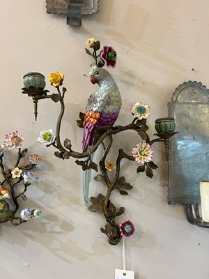Lot 105 - A pair of porcelain and ormolu wall lights