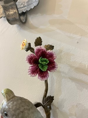 Lot 105 - A pair of porcelain and ormolu wall lights