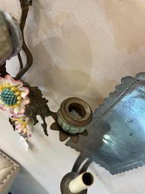 Lot 105 - A pair of porcelain and ormolu wall lights