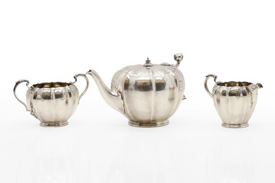Lot 41 - A silver three-piece tea service