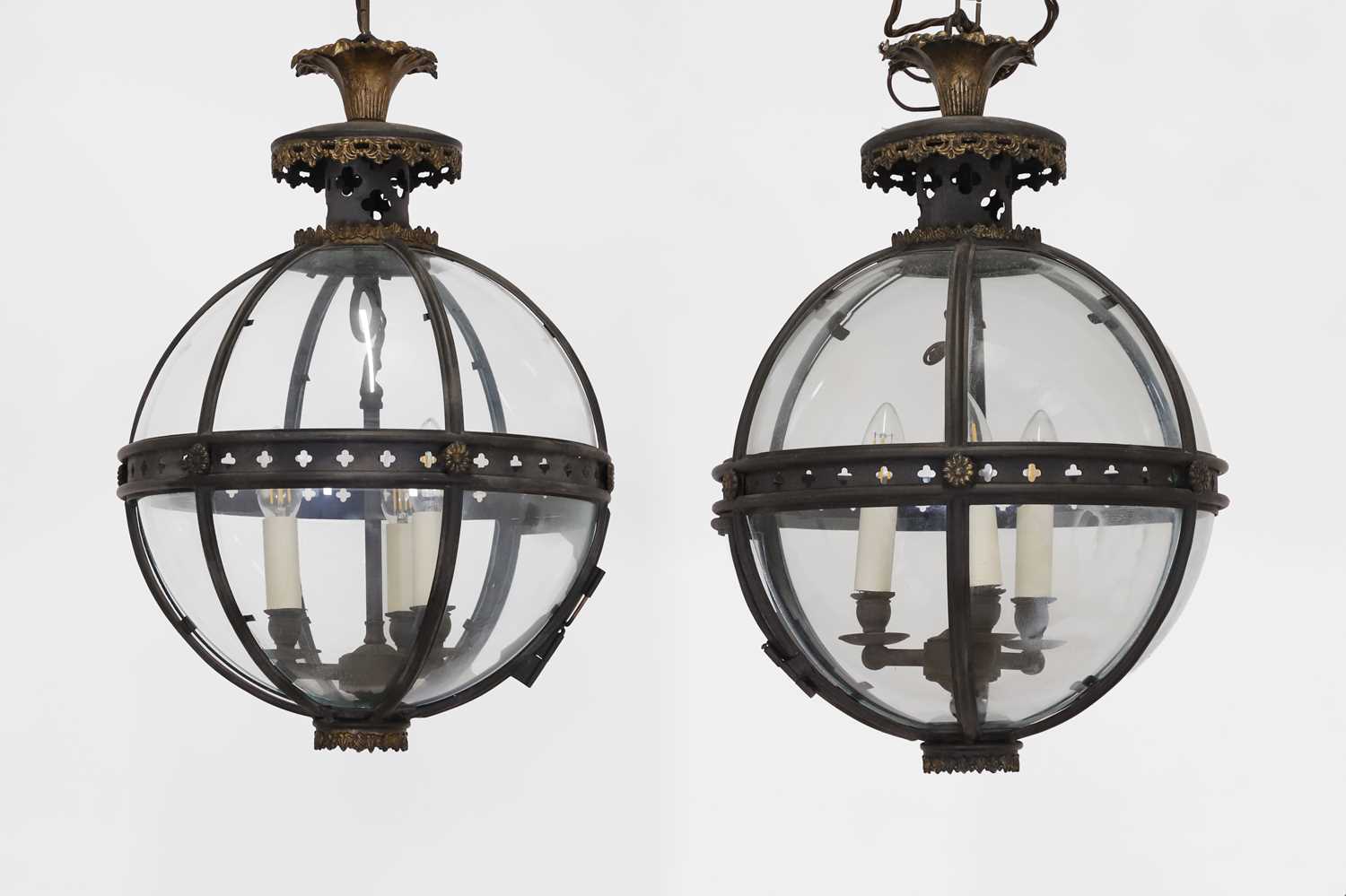 Lot 14 - A pair of bronze, gilt-brass and glass 'Pennington' globe lanterns by Jamb