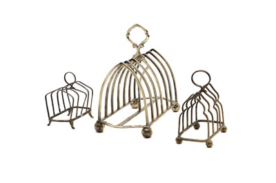 Lot 9 - A group of three silver toast racks
