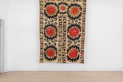 Lot 324 - An embroidered prayer suzani
