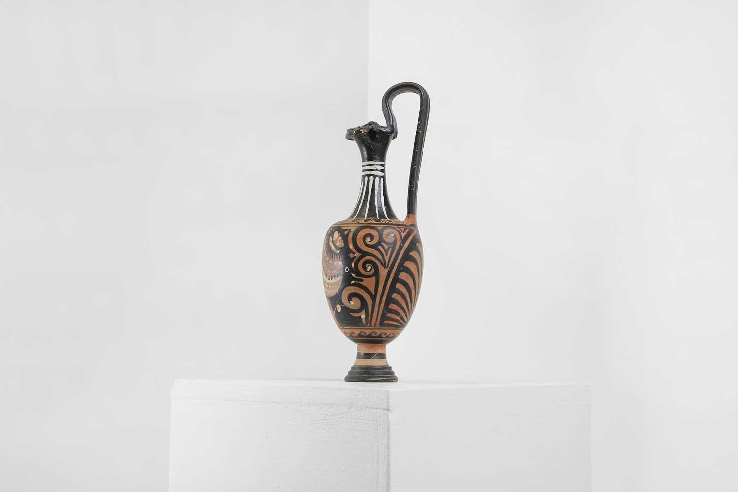 Lot 86 - An Apulian classical red-figure trefoil oinochoe