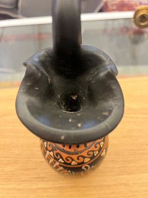 Lot 84 - An Apulian red-figure trefoil oinochoe, attributed to the painter of the Macinagrossa Stand
