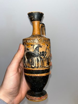 Lot 99 - An Attic black-figured lekythos in the manner of the Haimon painter