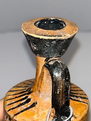 Lot 99 - An Attic black-figured lekythos in the manner of the Haimon painter