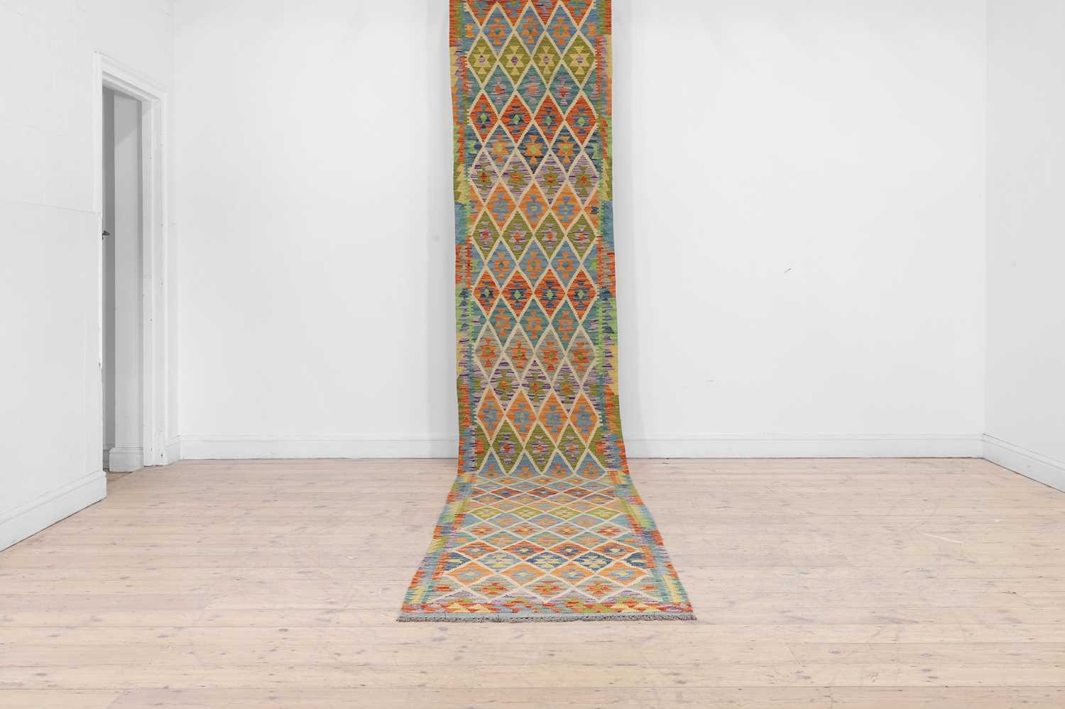 Lot 151 - A kilim flat-weave wool runner