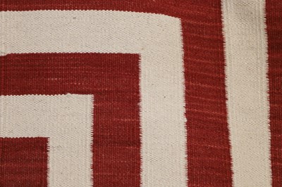 Lot 220 - A contemporary flat-weave carpet