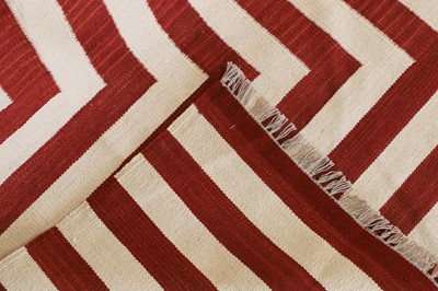 Lot 220 - A contemporary flat-weave carpet