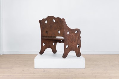 Lot 218 - A carved beech bench for Liberty of London