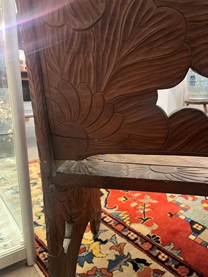 Lot 218 - A carved beech bench for Liberty of London