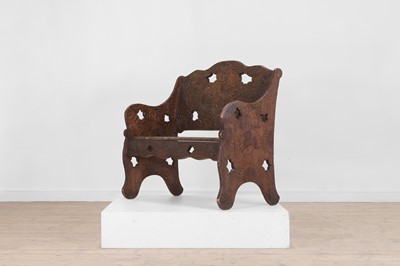 Lot 218 - A carved beech bench for Liberty of London