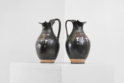 Lot 89 - A near pair of Apulian Gnathian ware pottery oinochoai