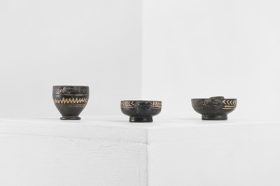 Lot 103 - A group of three Gnathian ware miniature pottery vessels