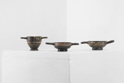 Lot 103 - A group of three Gnathian ware miniature pottery vessels