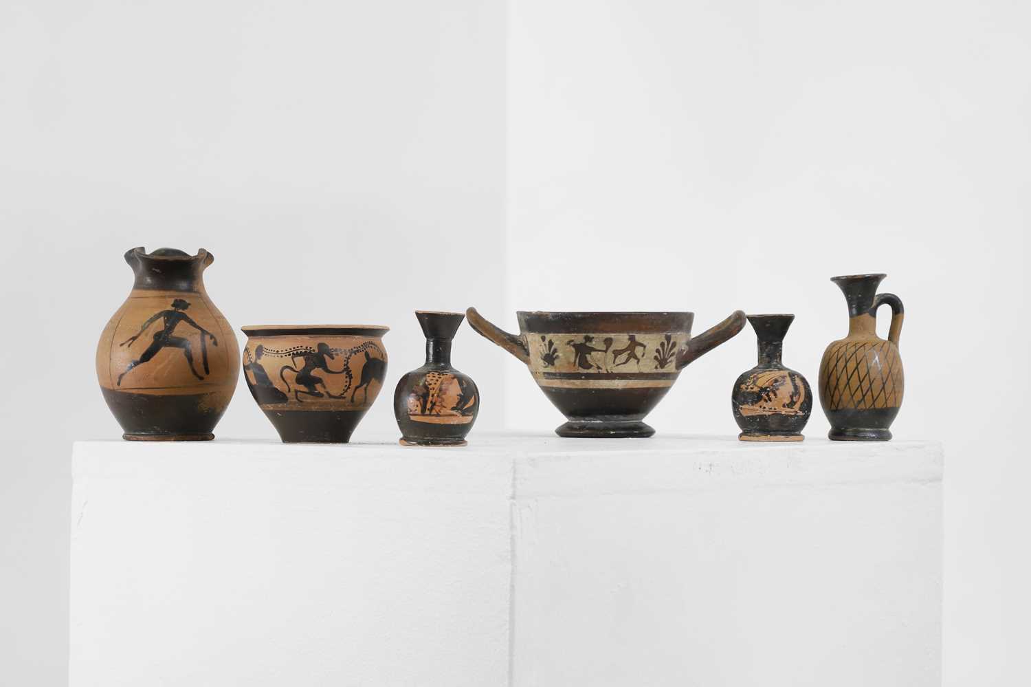 Lot 90 - A group of six small classical pottery vessels