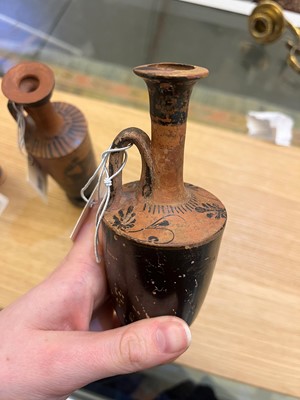 Lot 92 - A group of four Attic pottery lekythoi
