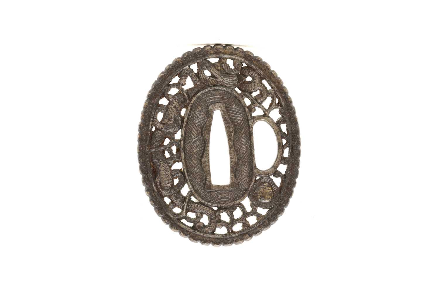 Lot 88 - A Japanese Namban School pierced iron tsuba