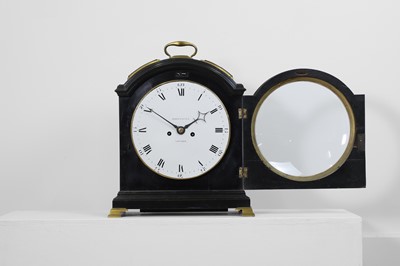 Lot 107 - A George III ebonised cased bracket clock