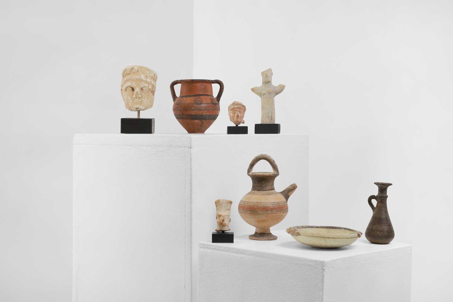 Lot 104 - A group of eight small Cypriot antiquities
