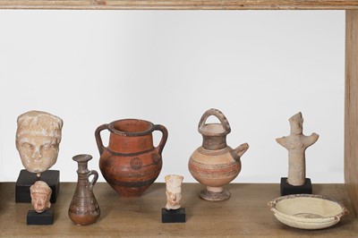 Lot 104 - A group of eight small Cypriot antiquities