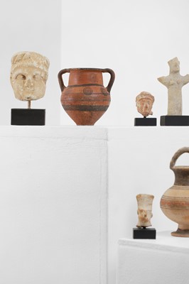 Lot 104 - A group of eight small Cypriot antiquities