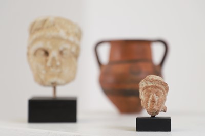 Lot 104 - A group of eight small Cypriot antiquities