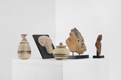 Lot 100 - A group of five small antiquities