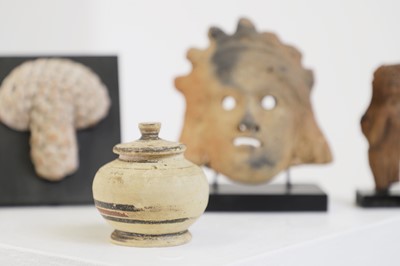 Lot 100 - A group of five small antiquities