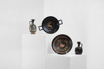 Lot 101 - A group of four Apulian pottery antiquities
