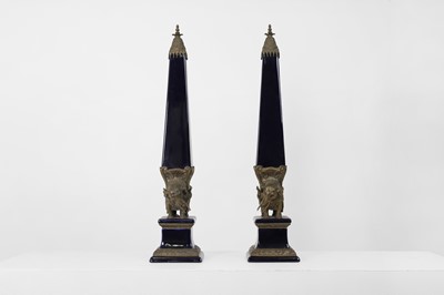 Lot 106 - A pair of porcelain and gilt-metal-mounted obelisks