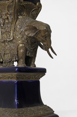 Lot 106 - A pair of porcelain and gilt-metal-mounted obelisks