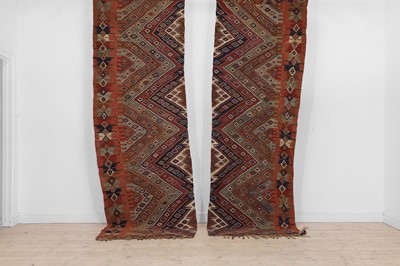 Lot 300 - An opposing pair of kilim flat-weave runners