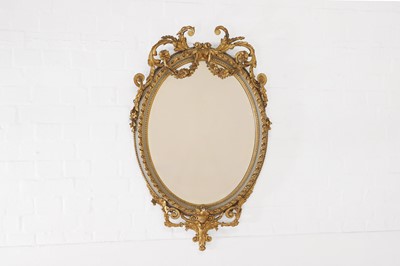 Lot 446 - A Louis XVI-style gilt and painted gesso oval mirror