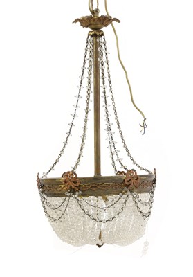 Lot 371 - An ormolu and cut glass chandelier